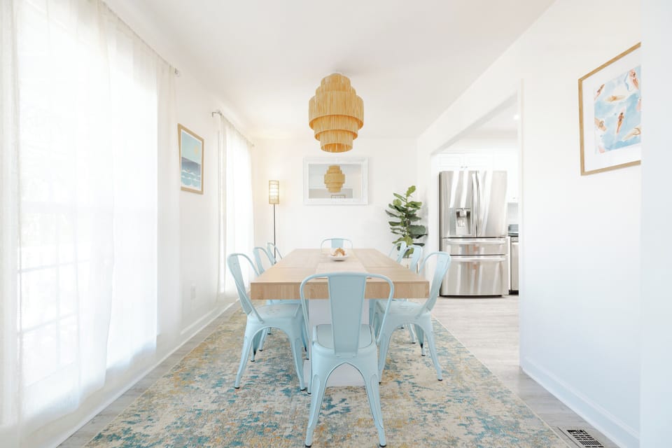 Open‑concept dining area designed for family meals, game nights, and coastal‑inspired gatherings.