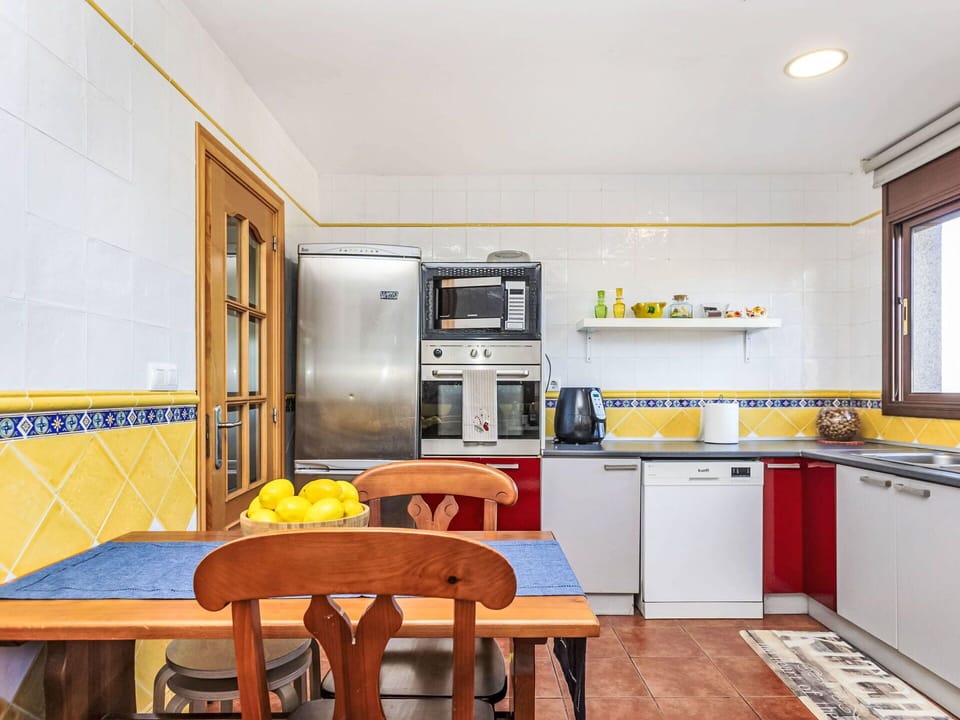 Kitchen, Flooring, Interior Design, Major Appliance, Countertop, Floor, Kitchen Appliance, Furniture, Cabinetry, Room