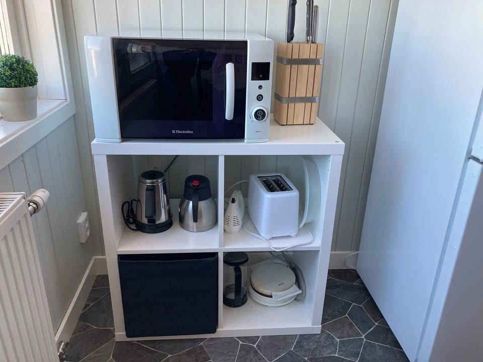 Apartment, City View | Private kitchen | Full-size fridge, microwave, oven, stovetop
