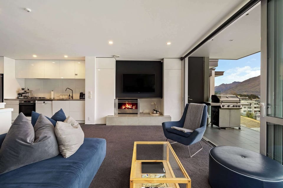 Large open plan living room featuring gas fireplace.

Please note:  The BBQ is not available for guest use.