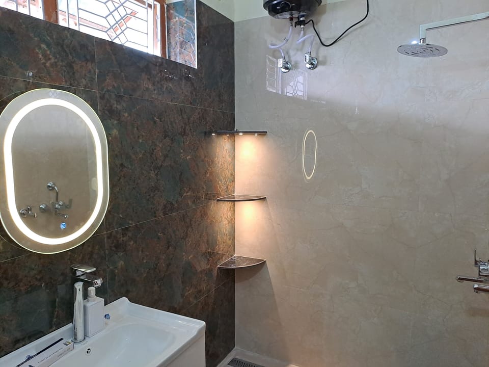 Shower, free toiletries, hair dryer, slippers