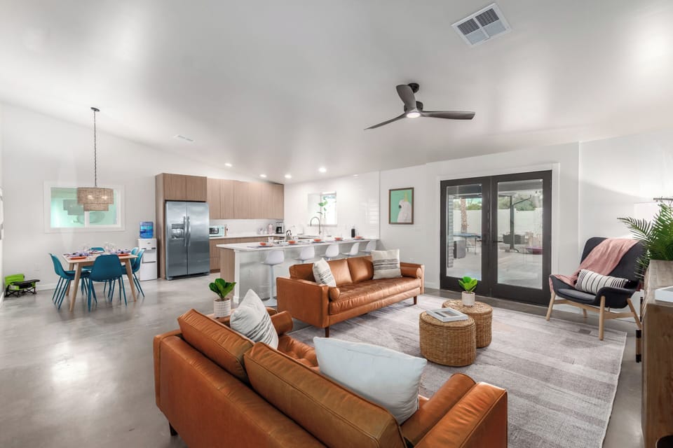 The cozy living room and open kitchen area with plenty of room to spread out