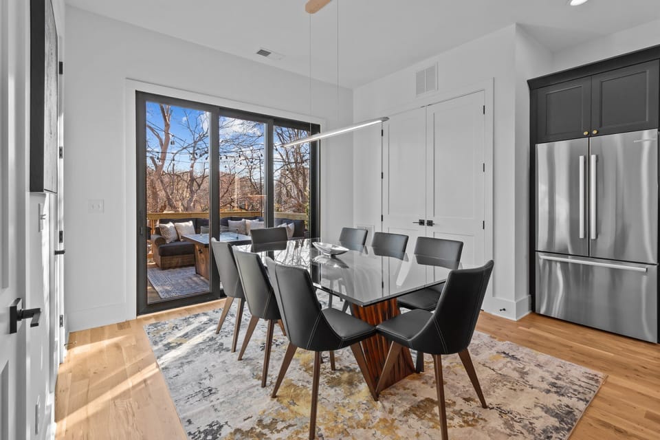 Outstanding dinning room with 8 leather chairs