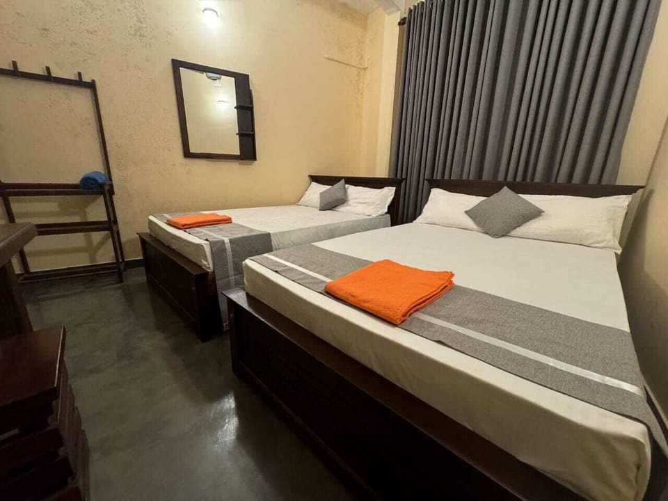 Standard Triple Room, City View | Desk, free WiFi