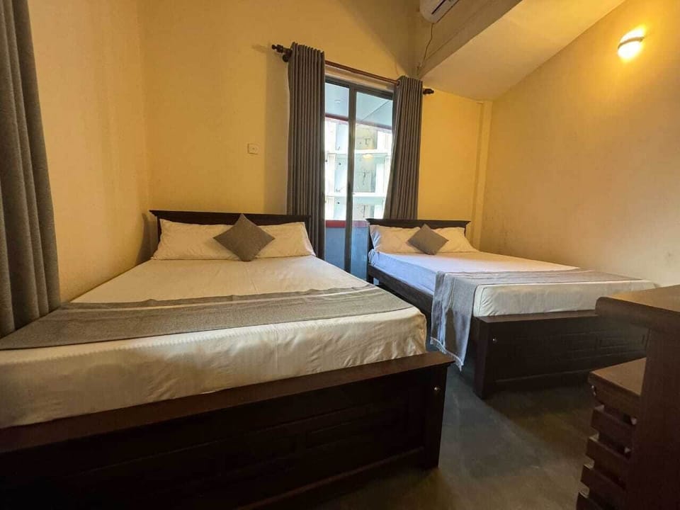 Standard Triple Room, City View | Desk, free WiFi