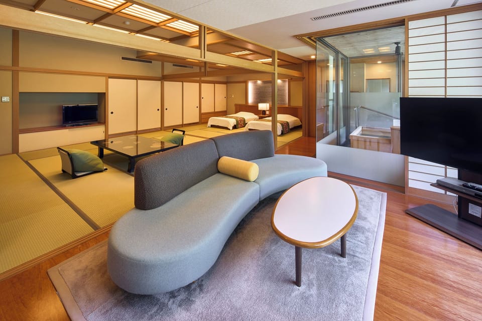 Deluxe Suite with open-air bath, River View, Non-Smoking | Living area