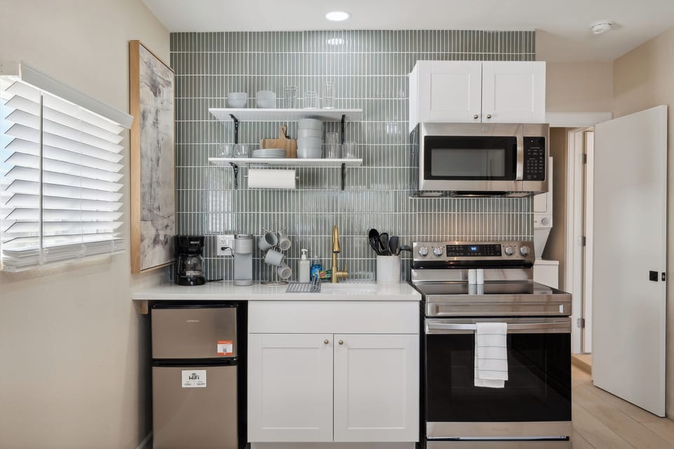 Cook full meals in this fully equipped kitchen.