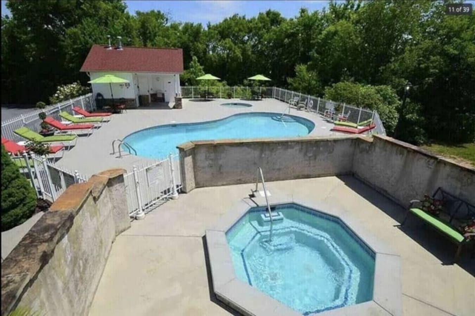 The community pool (seasonal) is available for all guests of Green Apple Townhouse. It includes a kiddie pool and an outdoor hot tub.