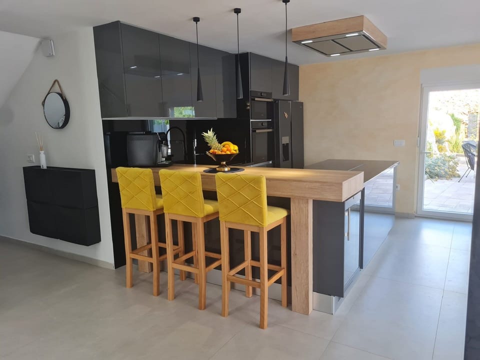 Villa (Four - Bedroom Villa) | Private kitchen | Fridge