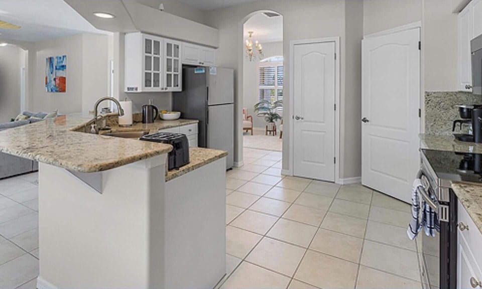 Villa | Private kitchen | Fridge, microwave, oven, stovetop
