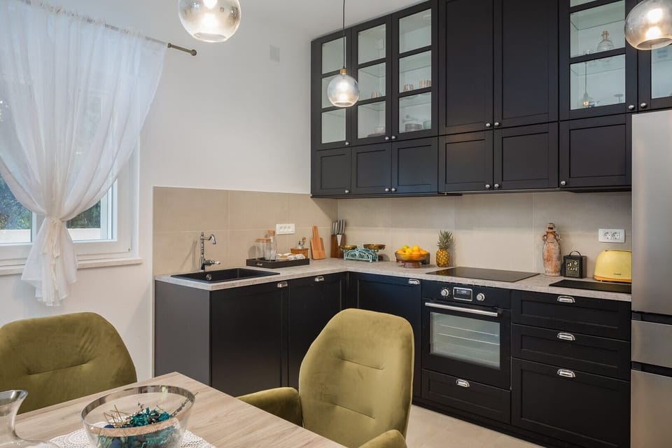 Including a fridge, freezer, Dolce Gusto capsule coffee maker, toaster, kettle, and microwave