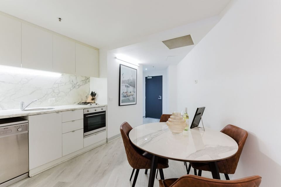 Round table for three to dine in the kitchen.