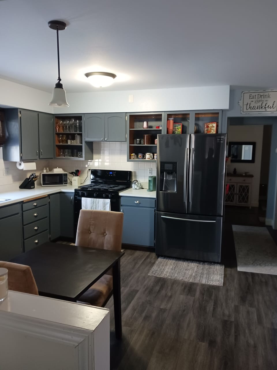 Full kitchen with dishes, pans, silverware.  Refrigerator dispenses water, ice.