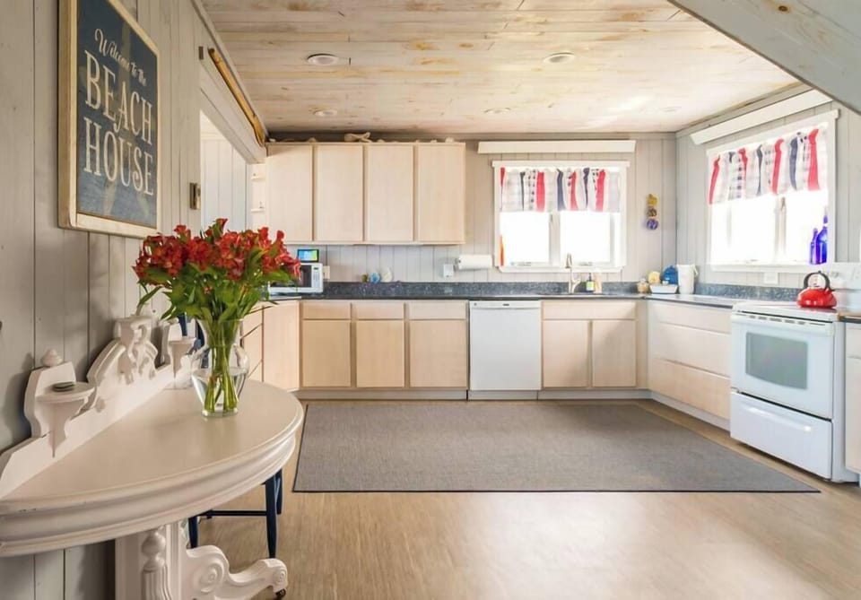 THE KITCHEN: Clean, well-ordered and open to conversation from the common area.
