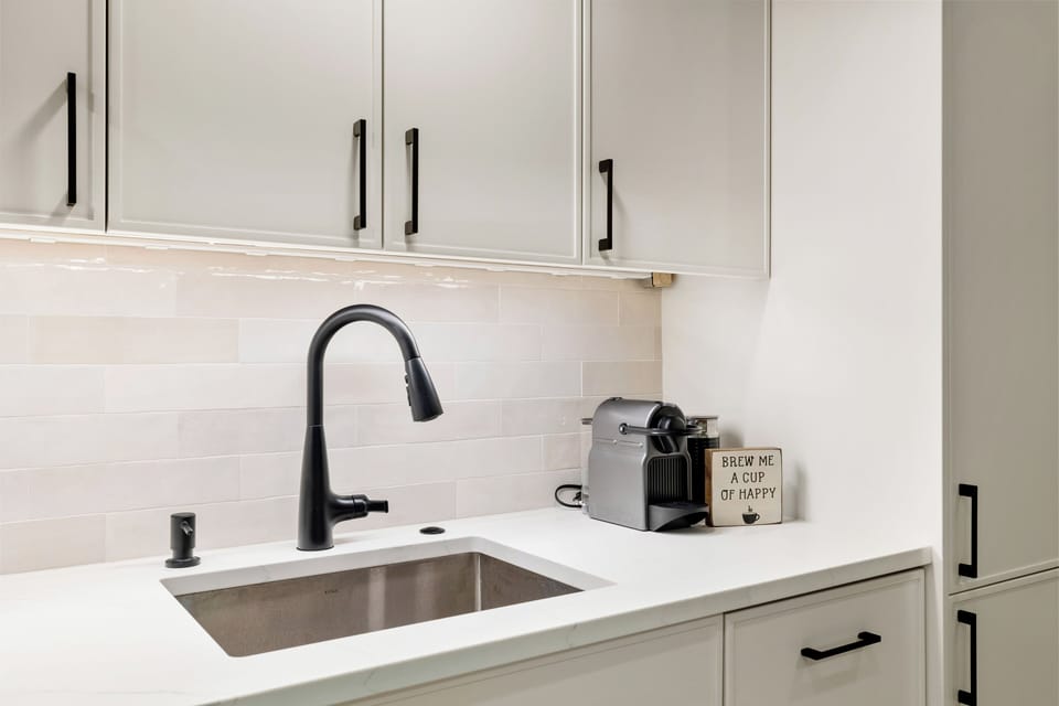 Kitchen has a Nespresso machine and French press
