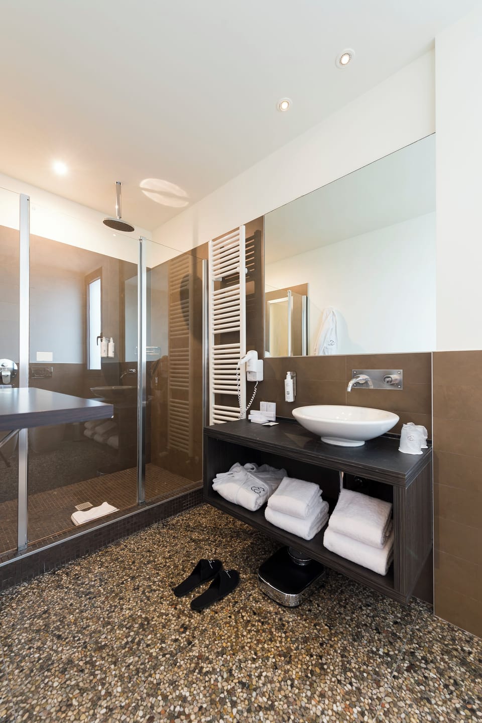 Shower, free toiletries, hair dryer, slippers