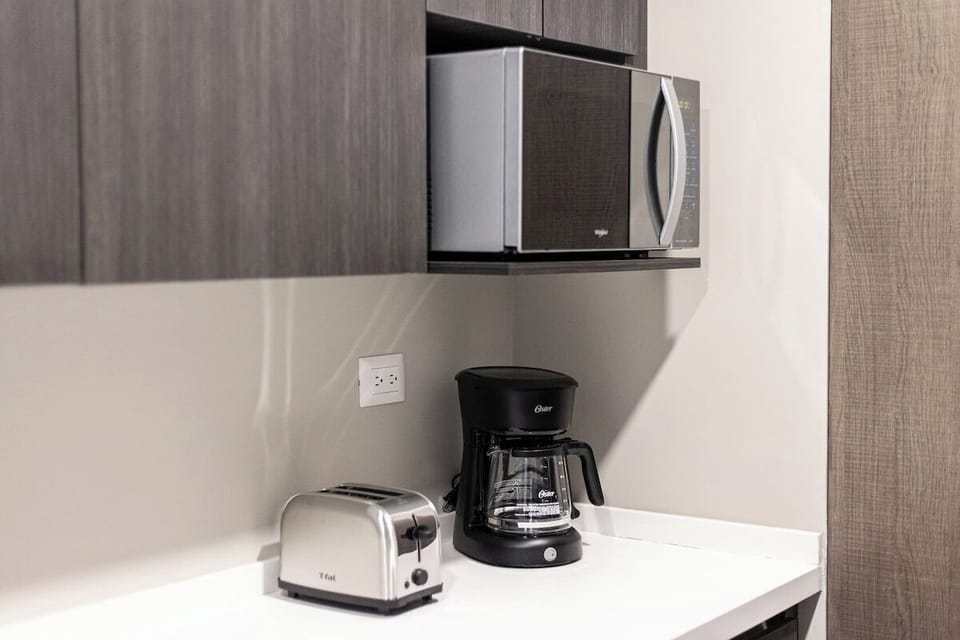 Apartment, Multiple Beds, Mountain View | Private kitchen | Coffee/tea maker, fridge, stovetop, toaster