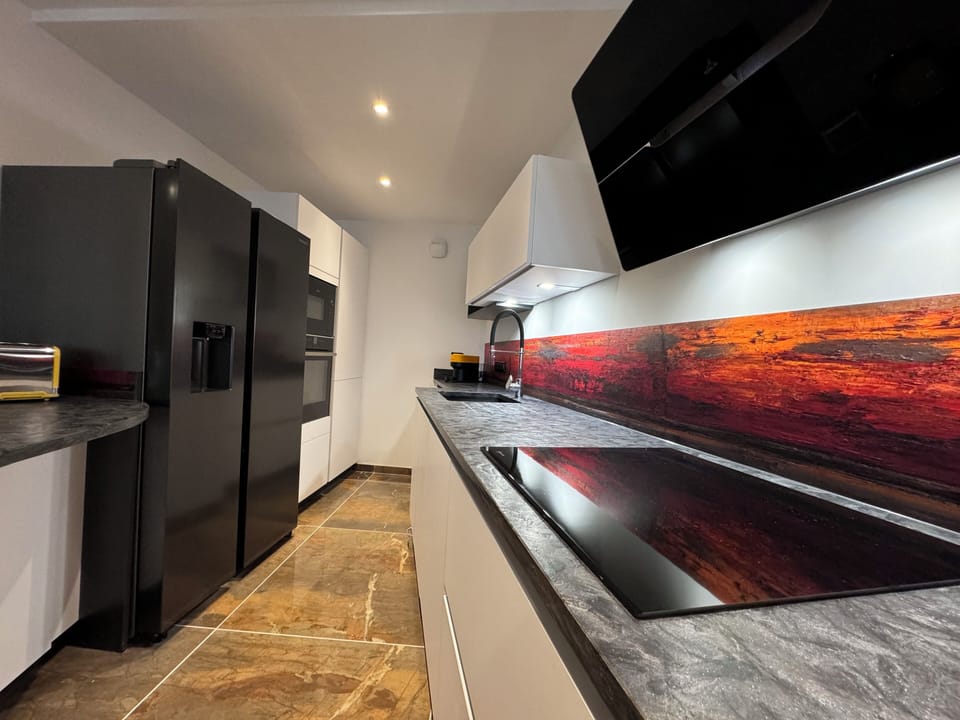 Deluxe Apartment, 3 Bedrooms | Private kitchen | Espresso maker, electric kettle