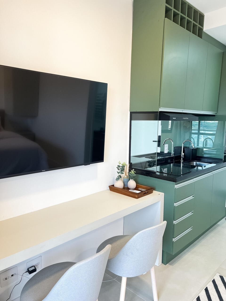 Executive Studio, Balcony, City View | Living area | 50-inch Smart TV with digital channels