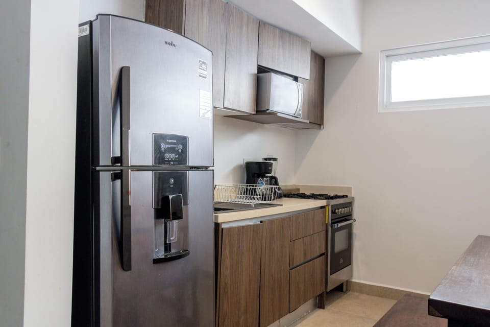 Deluxe Apartment | Living area | TV