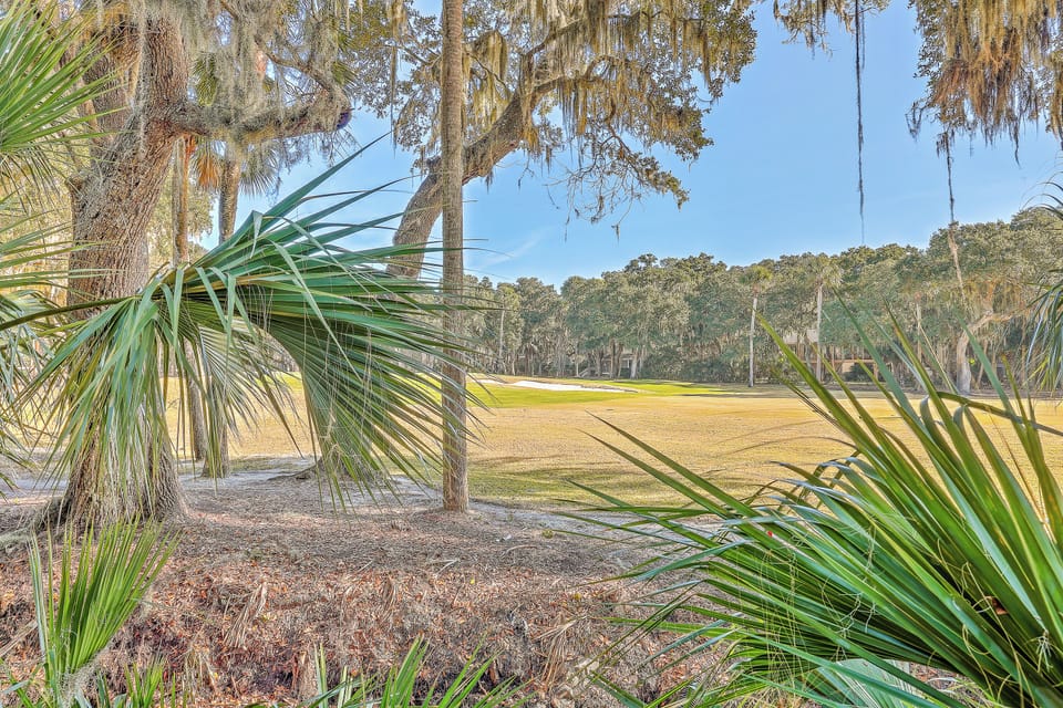 Take in the beautiful golf course views from the deck.