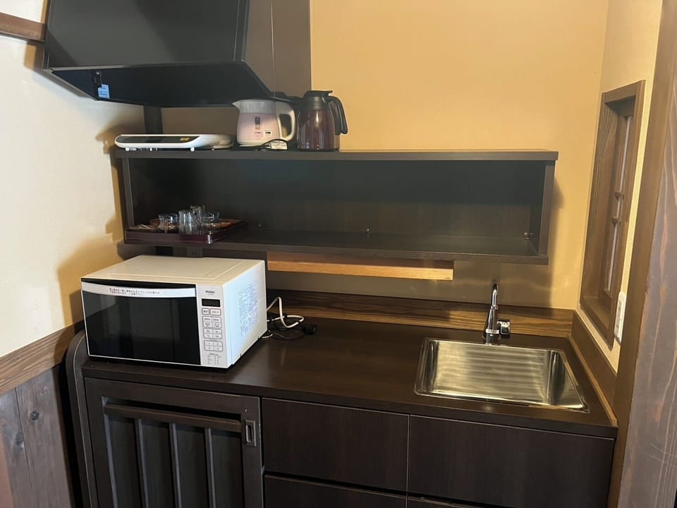 Basic Quadruple Room, Mountain View | Private kitchen