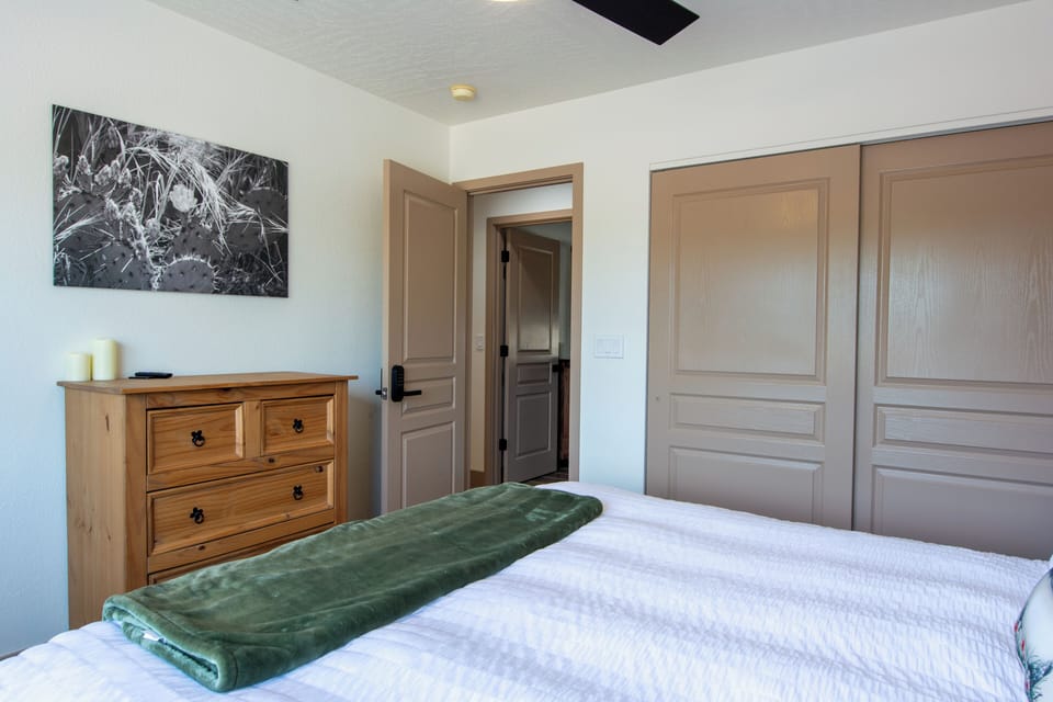 Second bedroom, extra blankets and local art