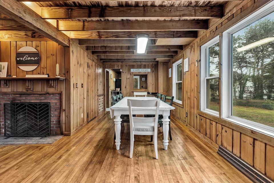 Experience the warmth of this inviting dining area, where every meal comes with a view and a touch of rustic elegance.