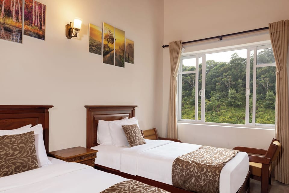 Deluxe Triple Room, Balcony, Mountain View | In-room safe, desk, laptop workspace, blackout drapes