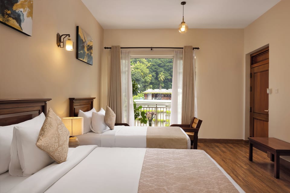 Deluxe Triple Room, Balcony, Mountain View | In-room safe, desk, laptop workspace, blackout drapes