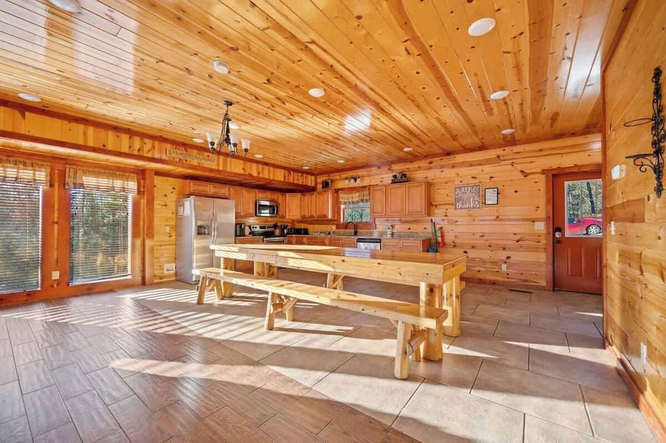 Kitchen & Dining: Spacious wooden dining area perfect for family feasts and laughter!