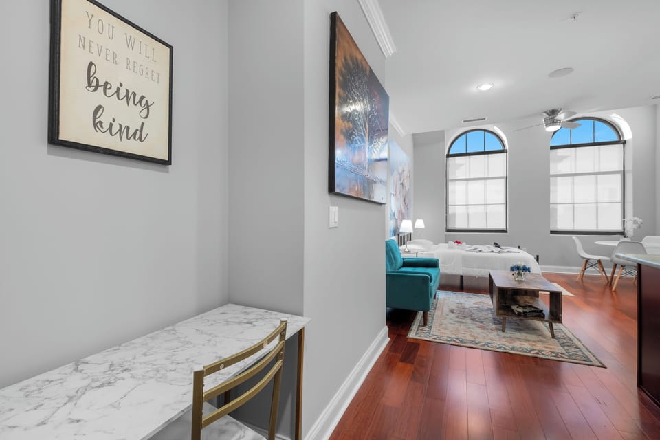 Living area entrance showing open layout and hardwood flooring throughout.