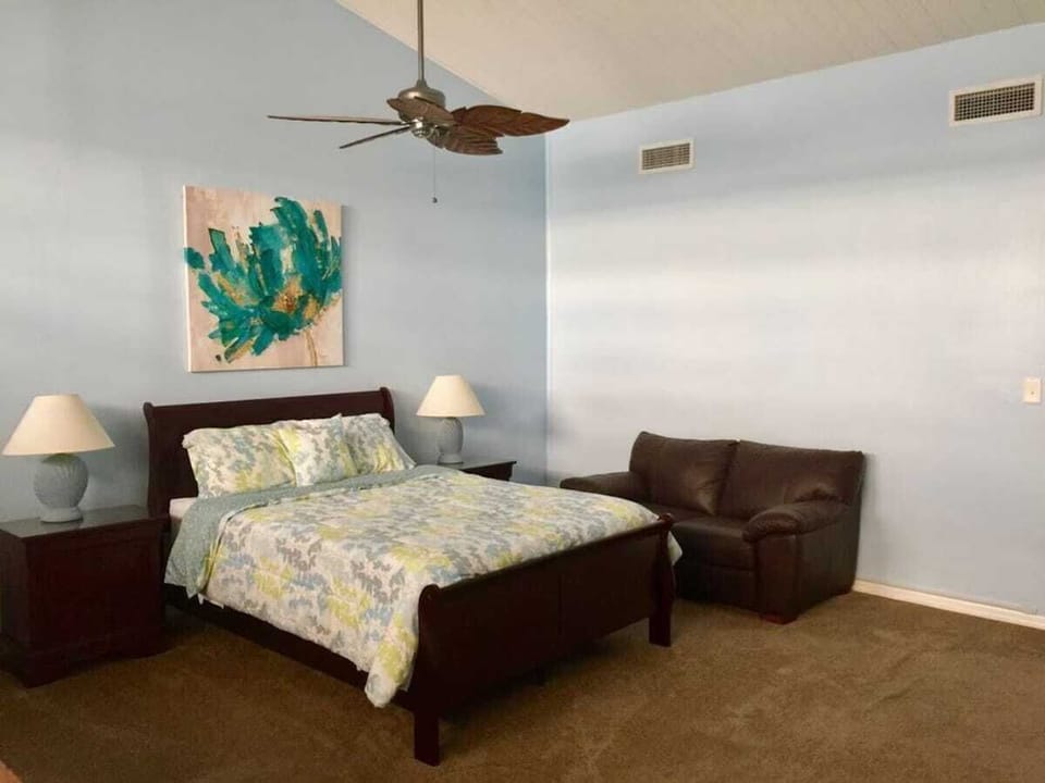 Loft Retreat: This private loft bedroom includes a Queen bed, ample storage, and a 55” TV. The attached large bathroom with dual sinks provides added convenience, making it a perfect space for guests seeking a little extra privacy and comfort.