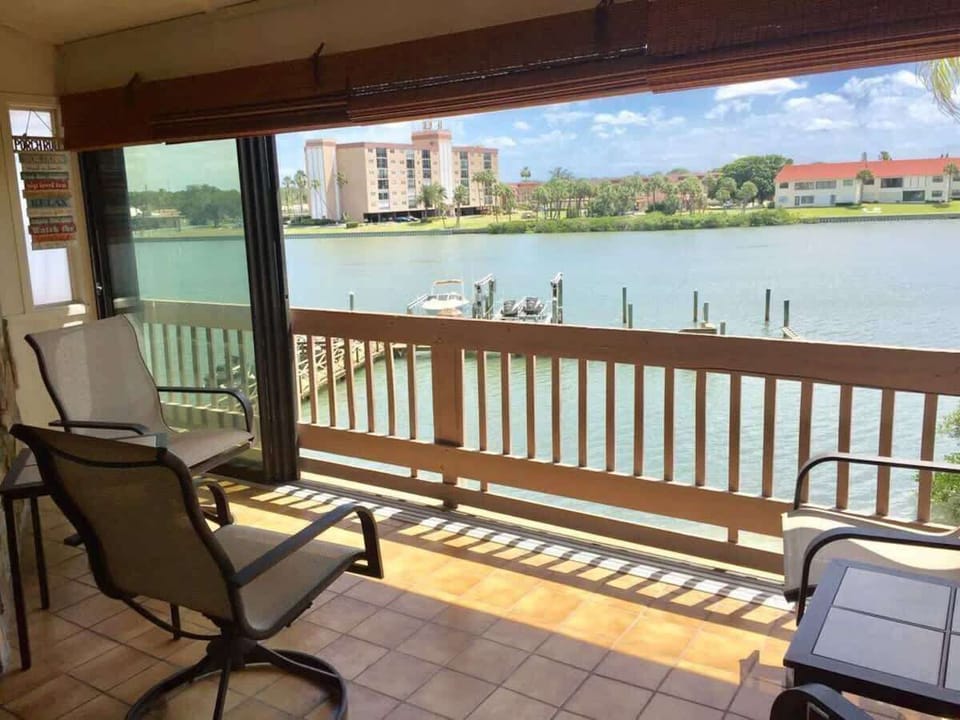 This private balcony overlooks the scenic Intercoastal and fishing dock, offering a serene space to unwind. Enjoy peaceful water views and coastal breezes, making it an ideal spot for morning relaxation or evening sunsets.