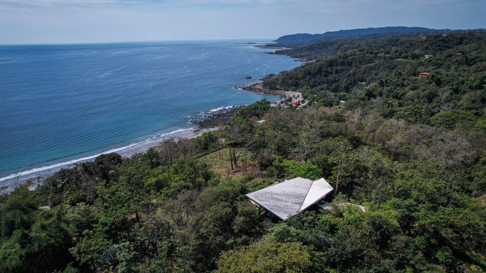 Drone view of Casa Ceibo and town of Montezuma beyond