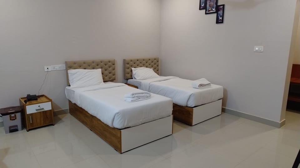 Deluxe Room | Premium bedding, blackout drapes, soundproofing, iron/ironing board