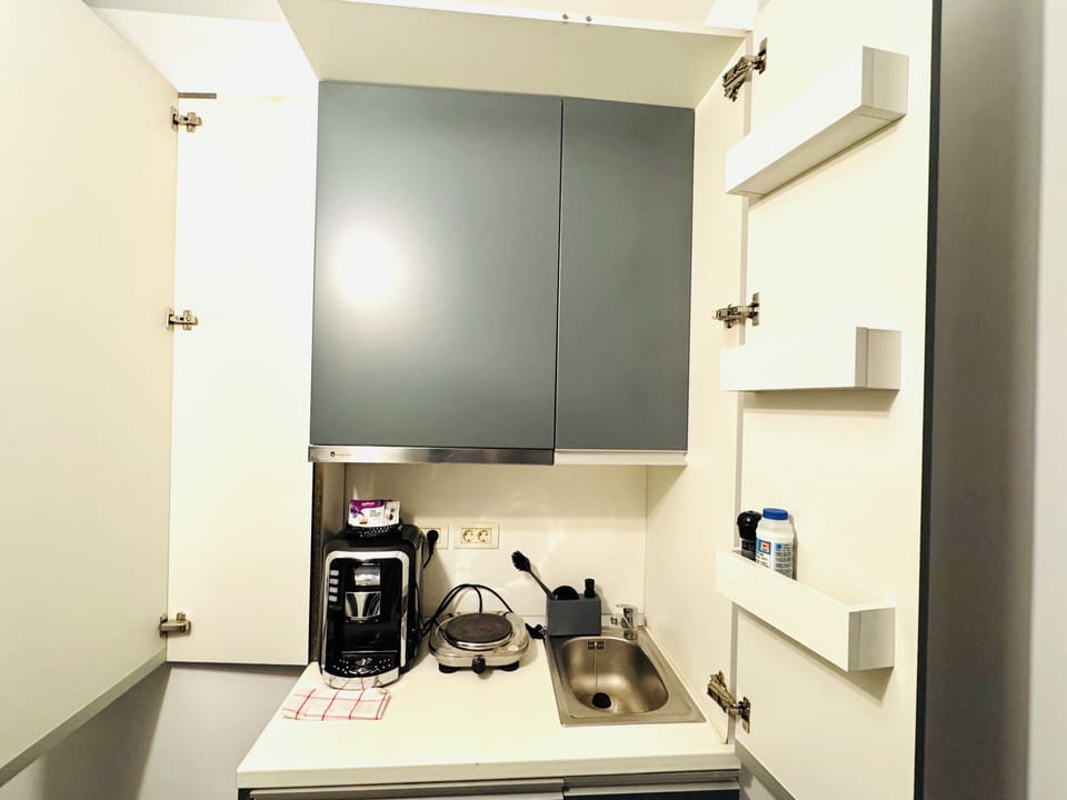 Deluxe Studio, Balcony, City View | Private kitchenette | Coffee/tea maker, electric kettle