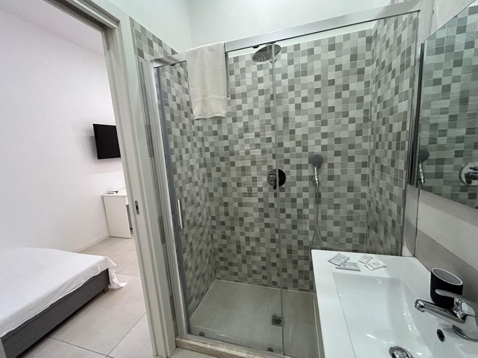 Shower, free toiletries, hair dryer, towels