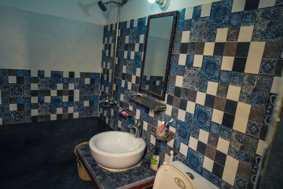 Shower, towels, soap, toilet paper