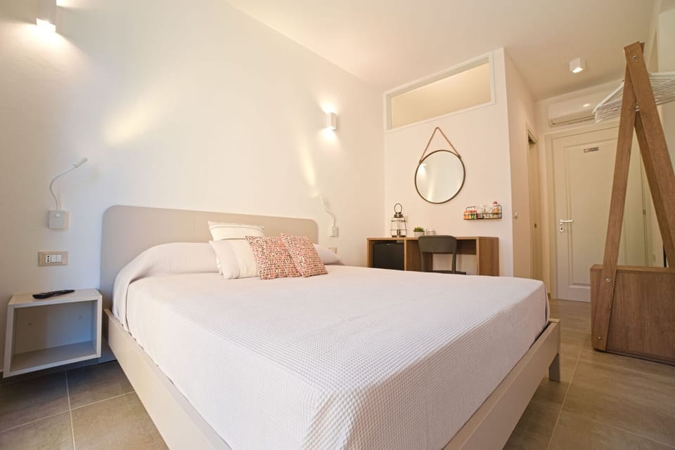 Basic Double Room, Patio, Courtyard View | Down comforters, Select Comfort beds, desk, laptop workspace