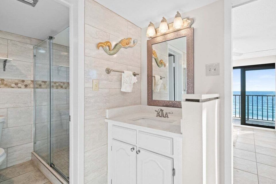 The ensuite also offers good lighting and a clean, simple layout for getting ready.