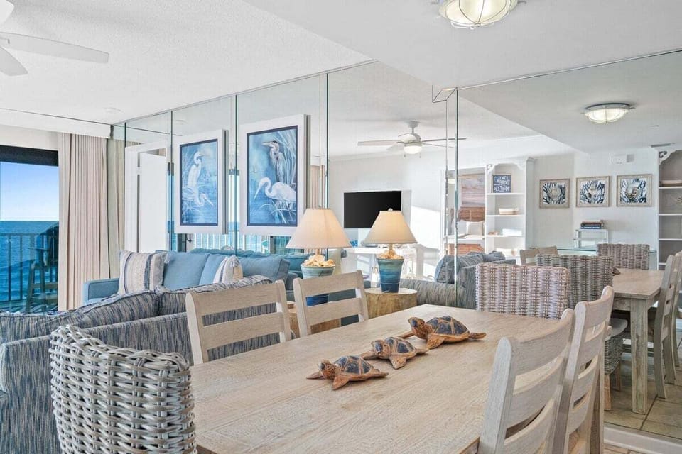 The large dining table comfortably seats six, perfect for family dinners or game nights.