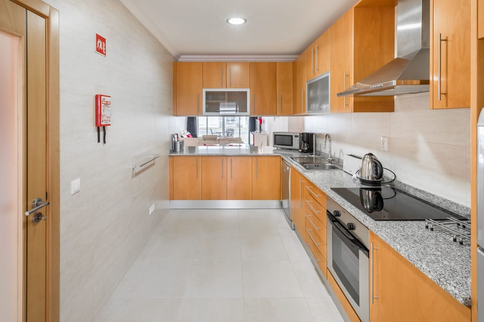 Apartment, 2 Bedrooms, Pool Access, Sea View | Private kitchen | Microwave, oven, dishwasher, coffee/tea maker