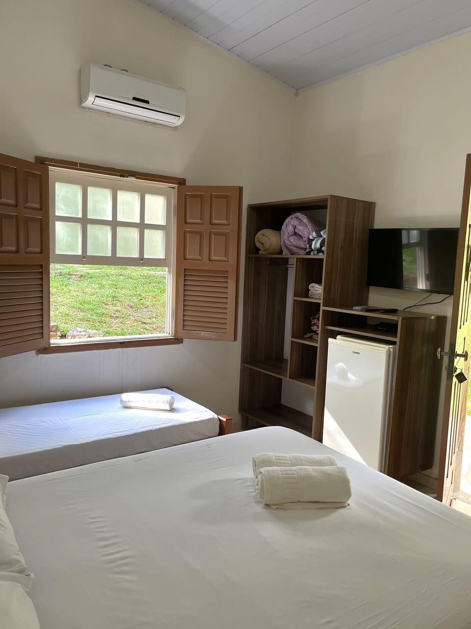 Standard Quadruple Room, Garden View | Individually furnished, free WiFi, bed sheets