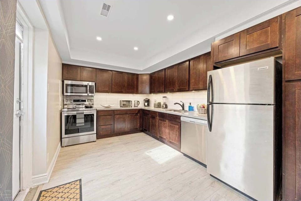 Channel your inner chef with sleek appliances and ample counter space for gourmet cooking.