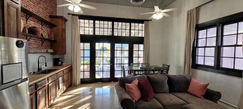 large bay doors converted into windows offers lots of light.