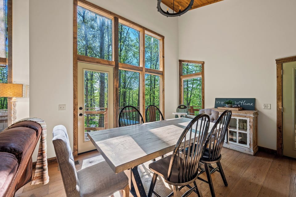 Dining table seats 6, with additional bar stools for extra seating.