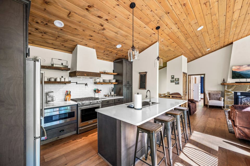 Fully equipped kitchen with drip coffee maker.