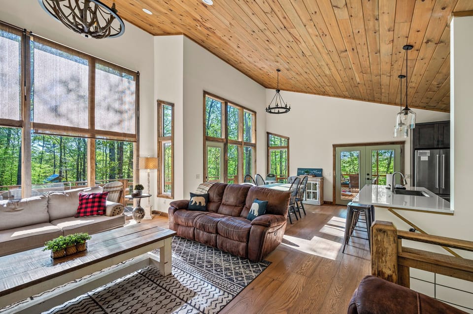 Open concept living room includes electric fireplace and TV with Firestick--bring your own passwords!