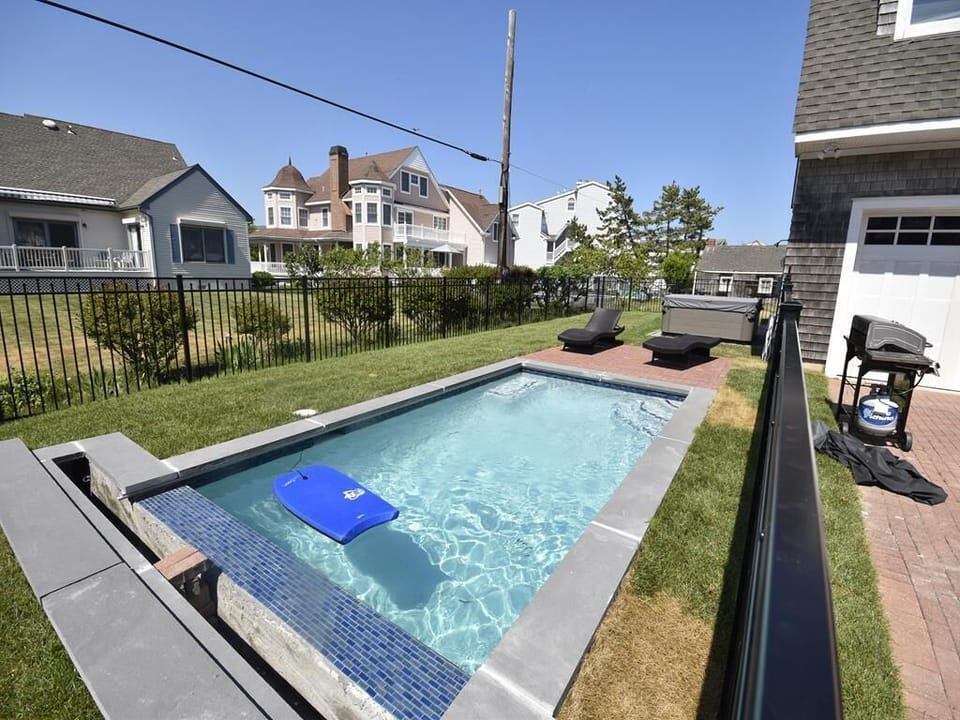 Refreshing shared swimming pool, perfect for cooling off on warm summer days and relaxing under the sun.